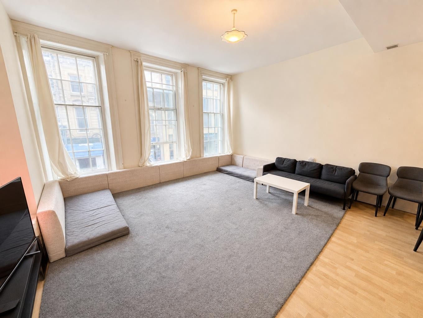 A bright living room used to illustrate the Property Studio workflow